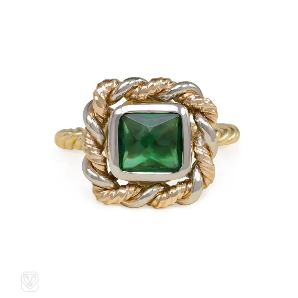 Emerald and mixed metal ring