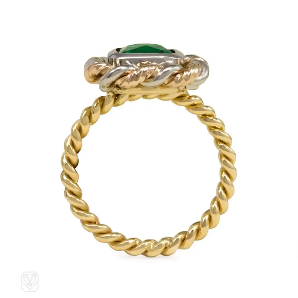 Emerald and mixed metal ring