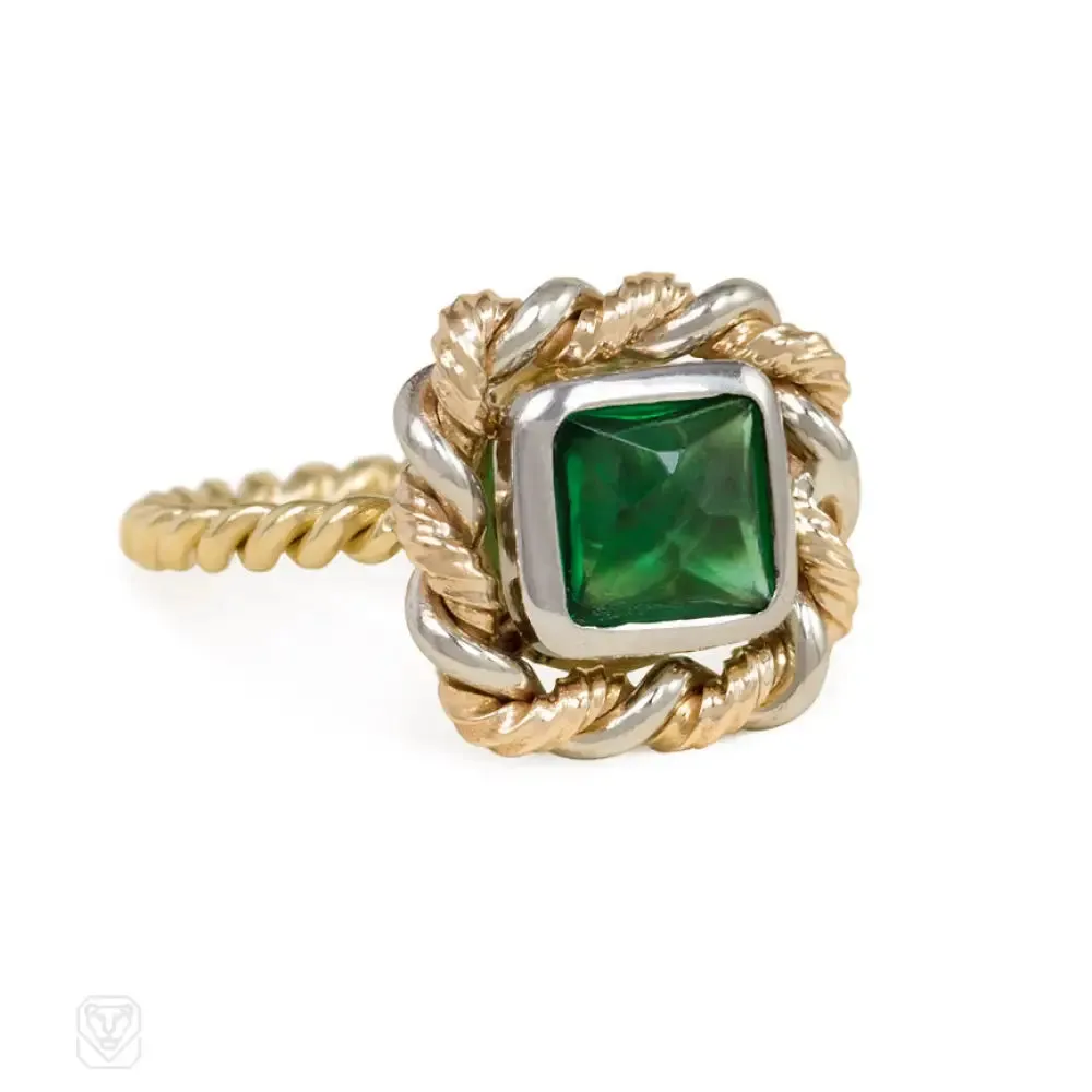 Emerald and mixed metal ring